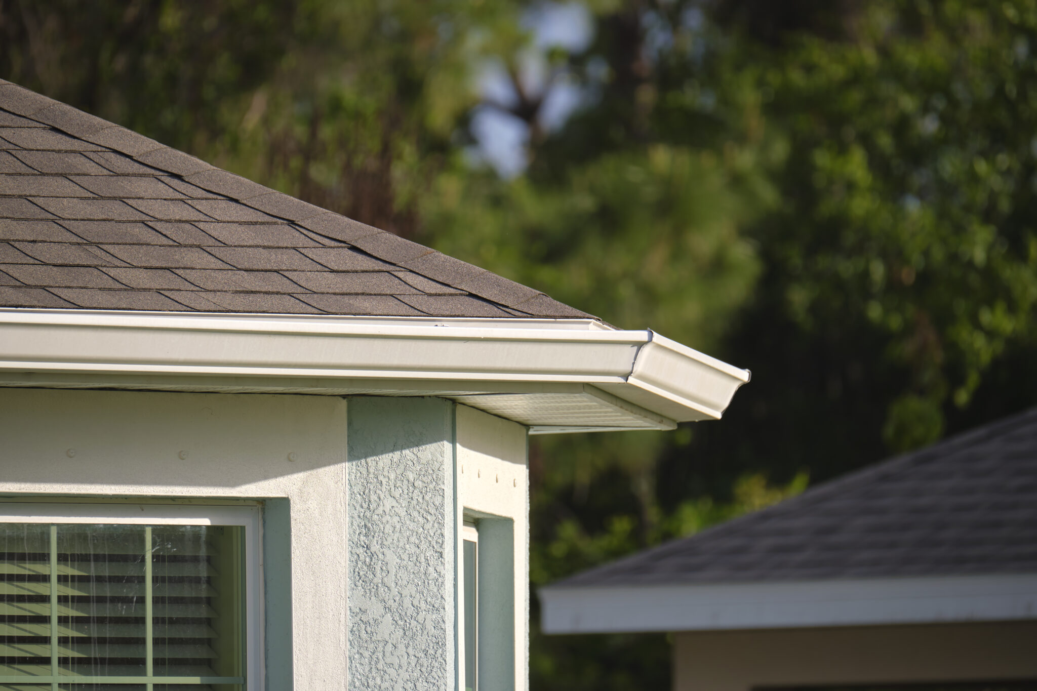 closeup-of-house-roof-top-covered-with-asphalt